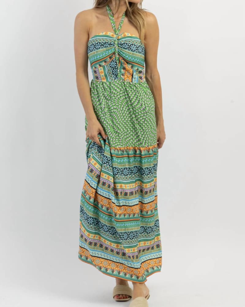 Front of a model wearing a size L Kahuna Halter Maxi Dress In Green in Green by DAVI & DANI. | dia_product_style_image_id:359417